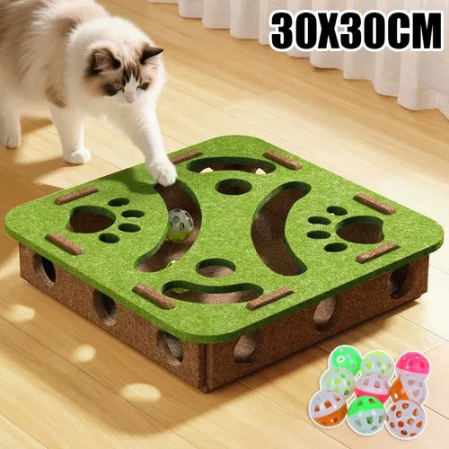 Cat playing with interactive puzzle toy, 30x30cm, green grass-textured, includes colorful balls for mental stimulation